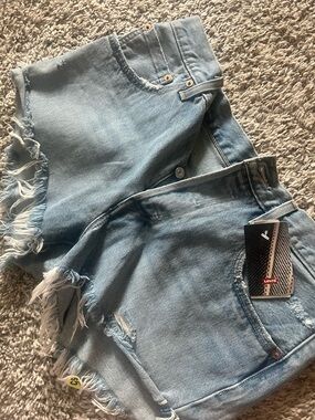 Levi's Light Blue Denim Jeans with Tan Leather Patch